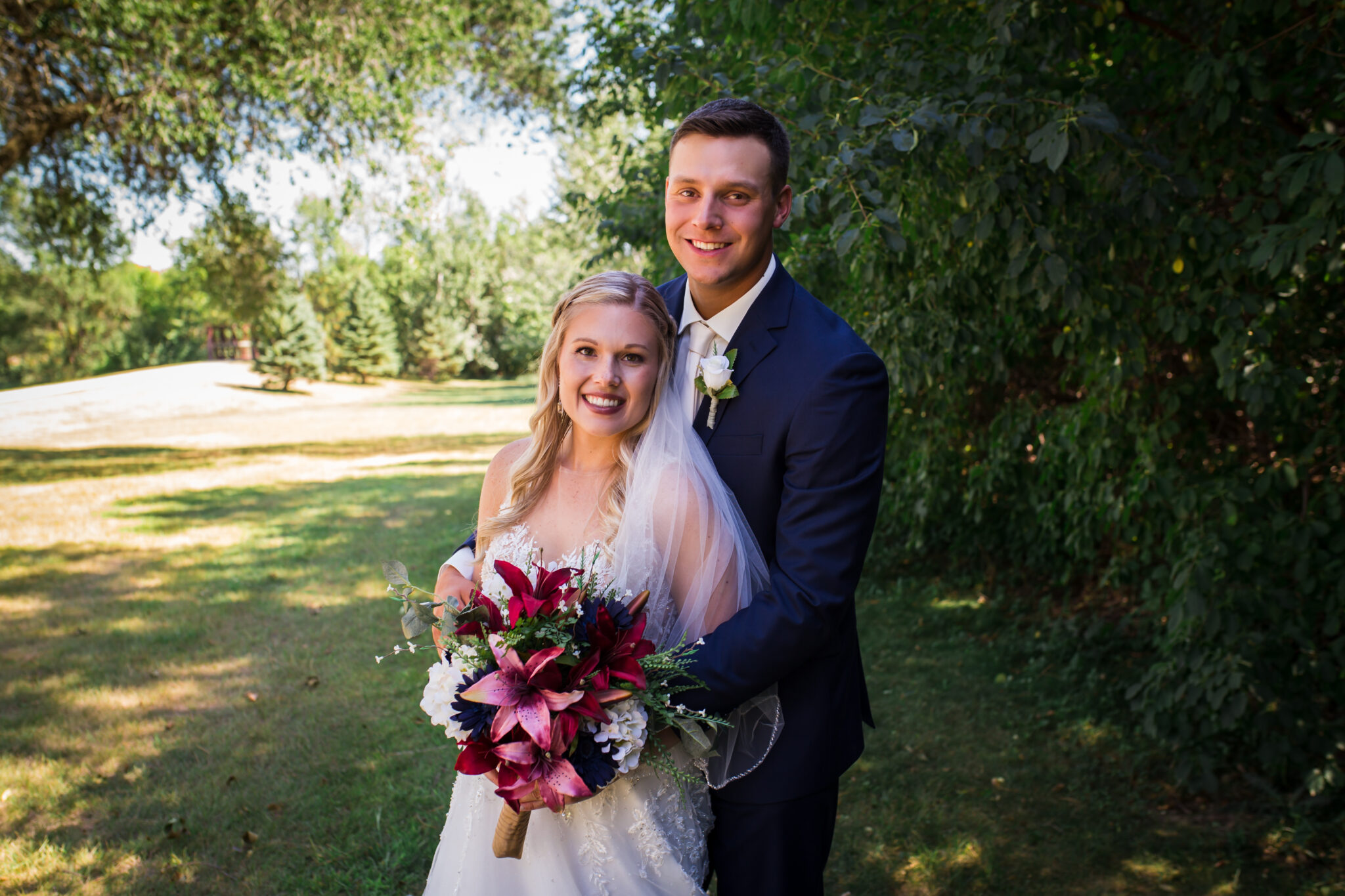 Couple Smiling At Camera Scaled